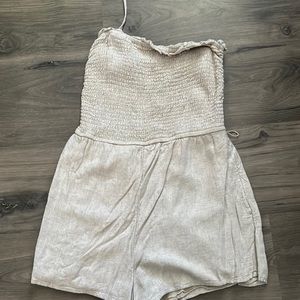 Tan smock jumper.